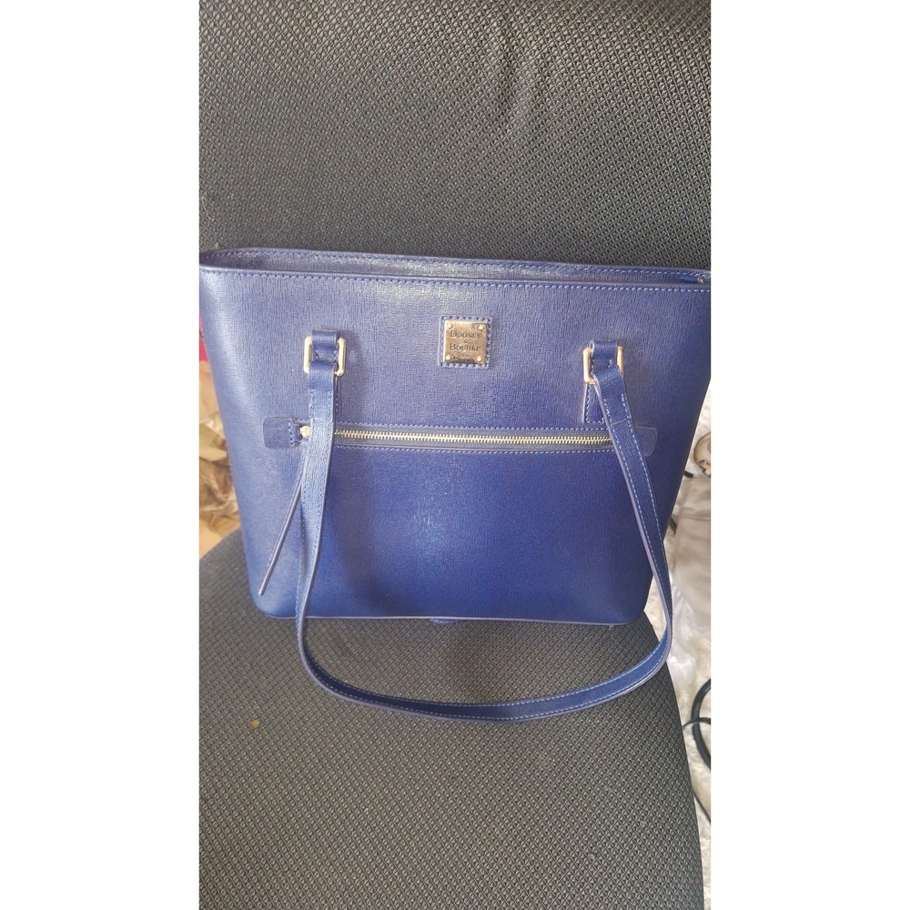 16. Dooney & Bourke Saffiano leather shopper tote in the color navy blue.